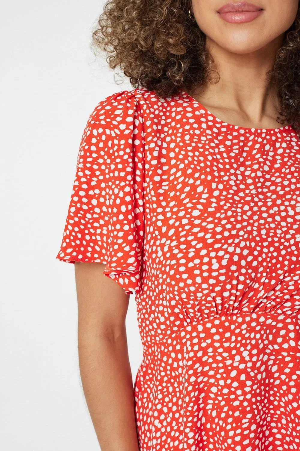 Polka Dot Peplum Blouse